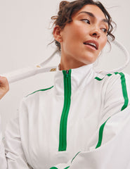 white and green half zip jacket