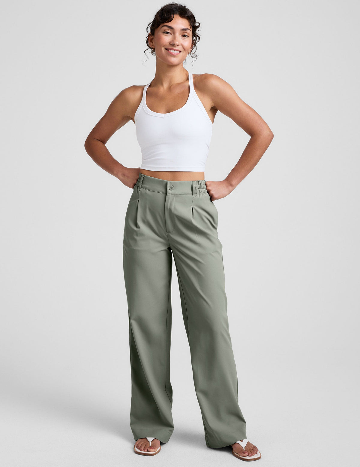 green mid-rise trouser pants with pockets.