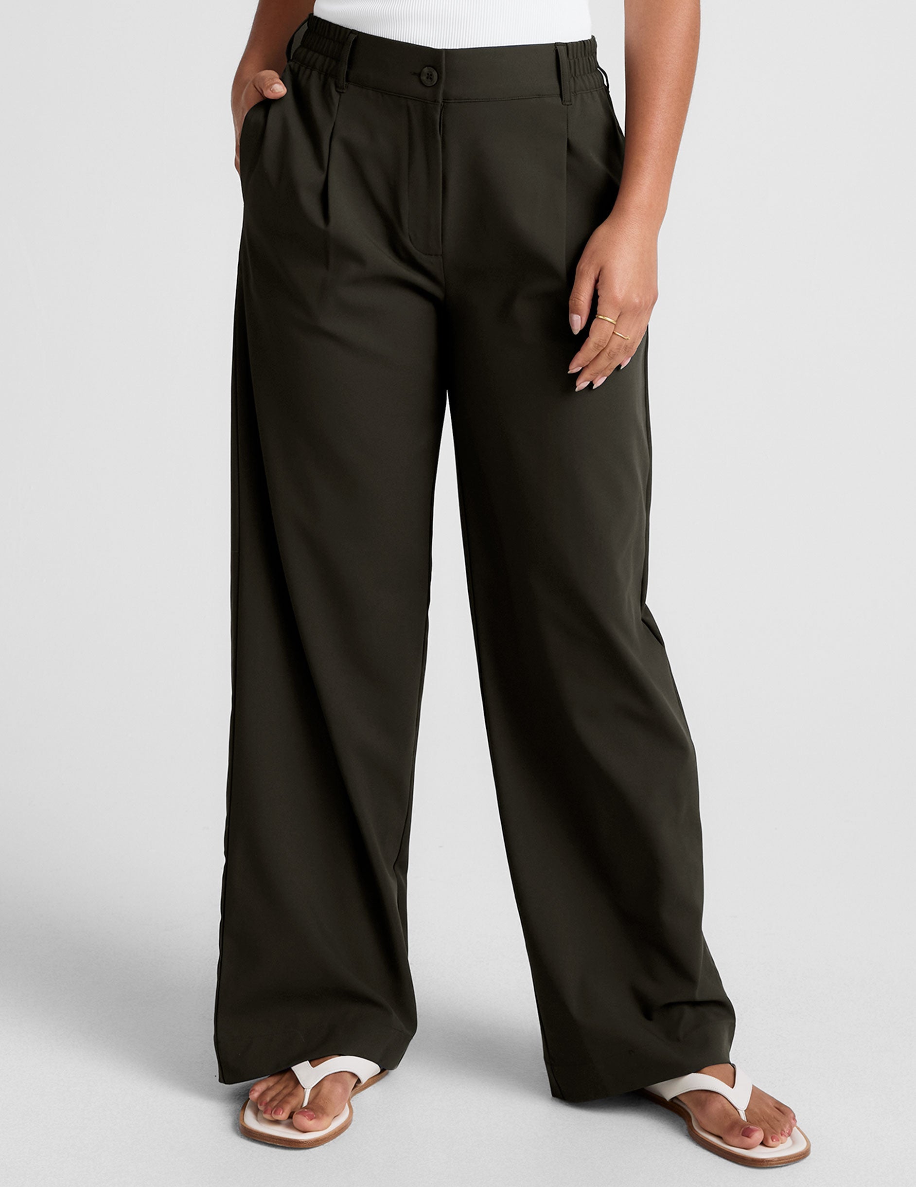 green trouser pants with pockets.