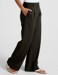 green trouser pants with pockets.