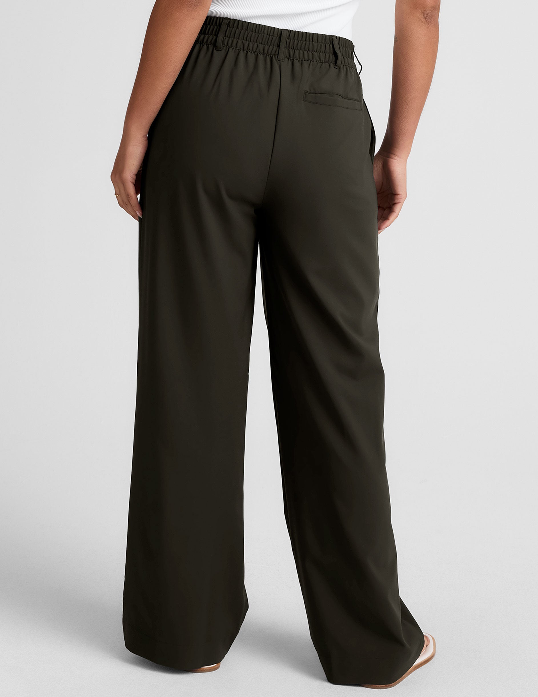 green trouser pants with pockets.