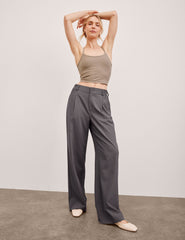 grey mid rise trousers with pockets.