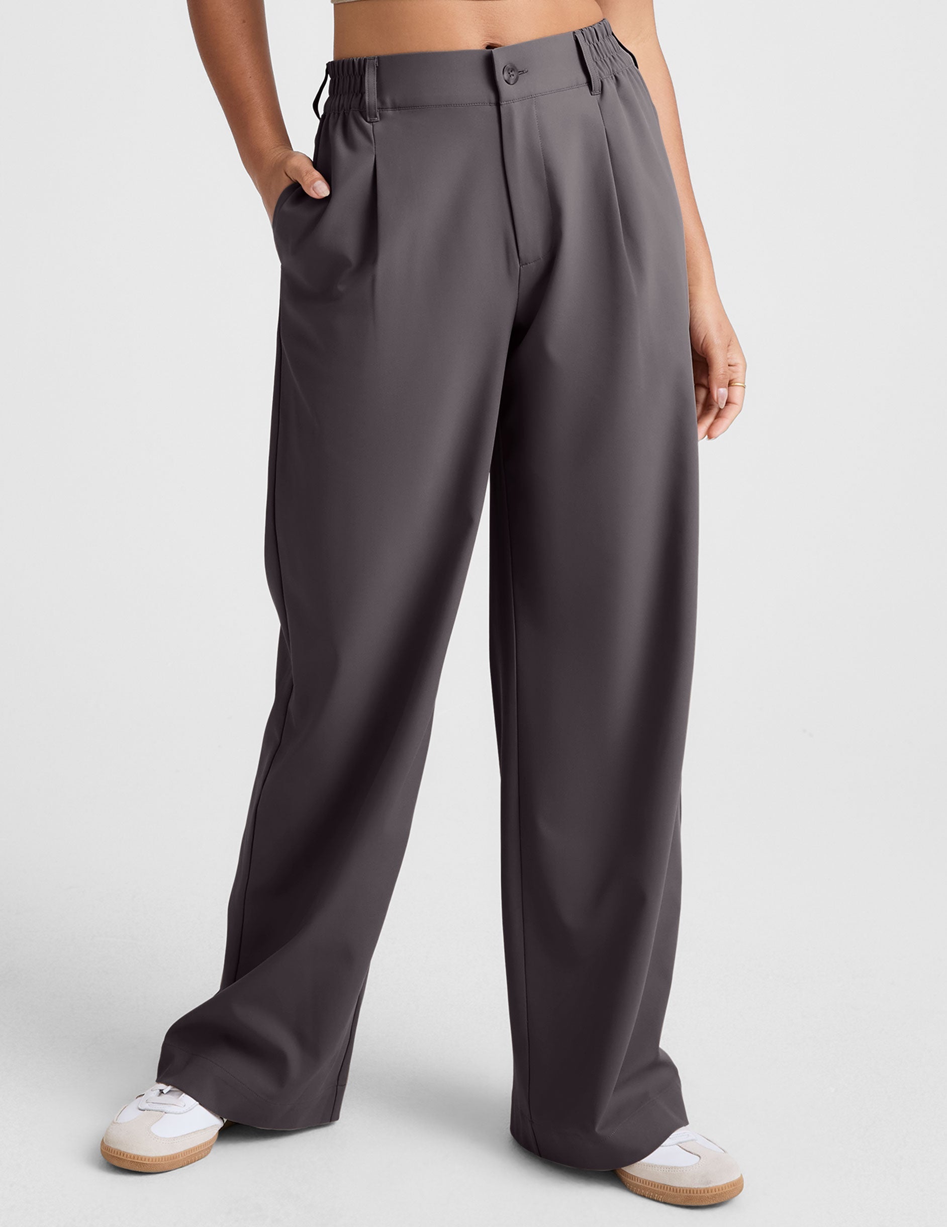 grey mid rise trousers with pockets.