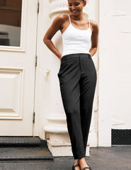 black trouser style pant with a tapered ankle and pockets.