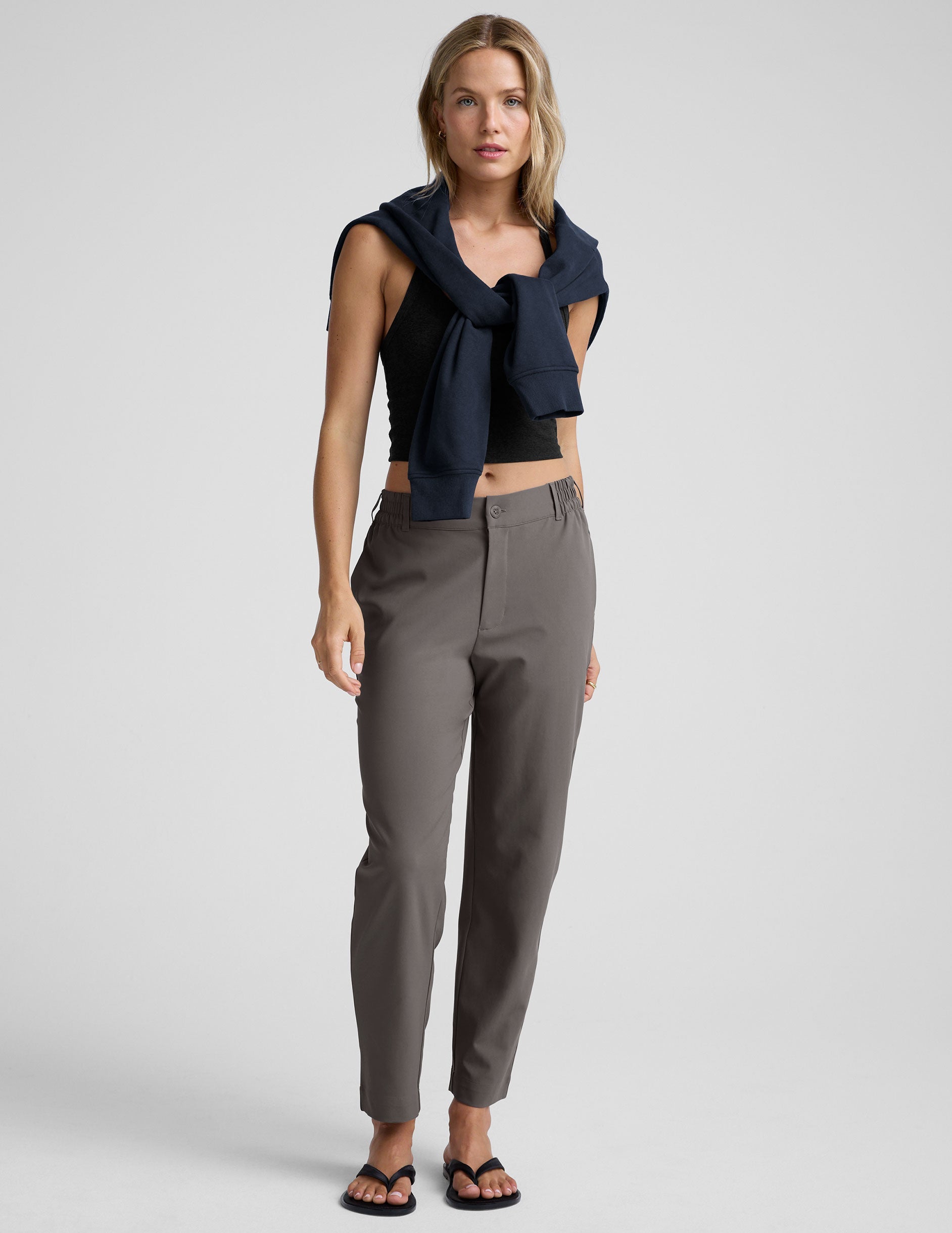 gray trouser style pant with a tapered ankle and pockets.