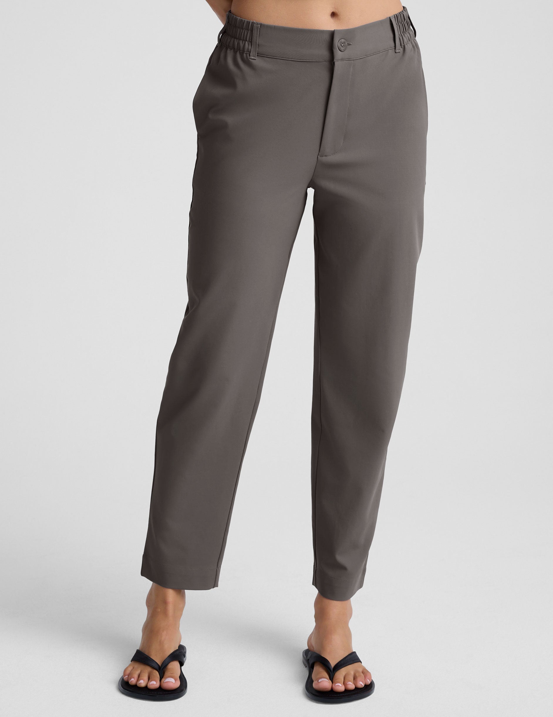 gray trouser style pant with a tapered ankle and pockets.