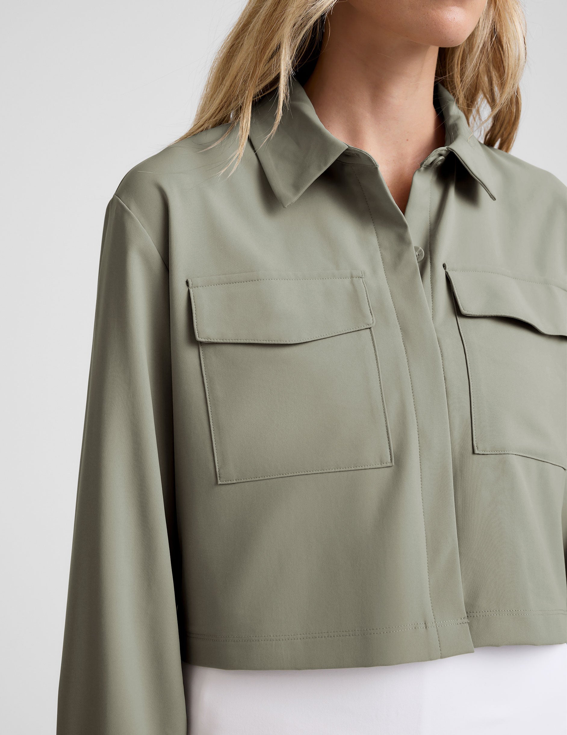 green button down cropped jacket.