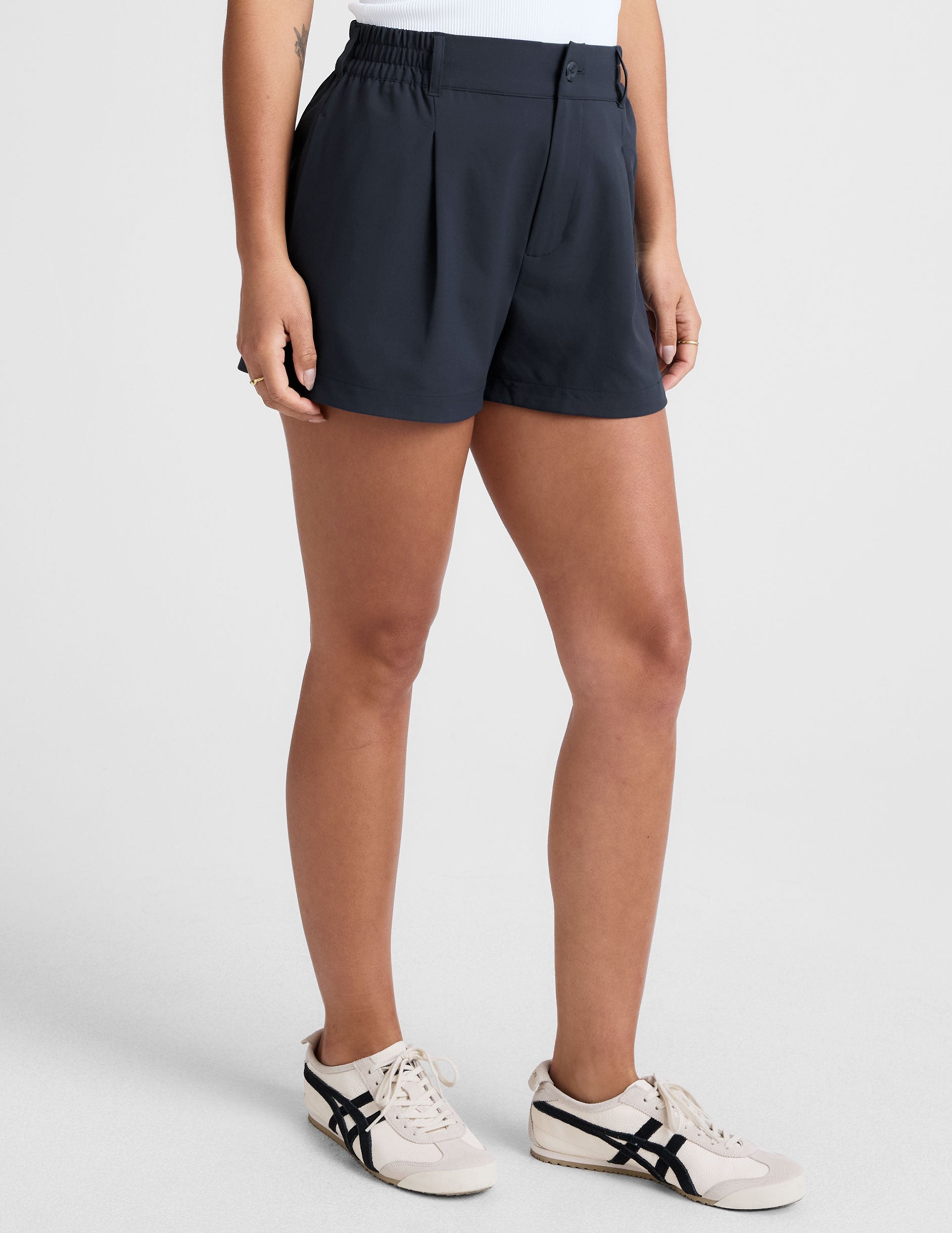 blue 4" inseam shorts with an elastic waistband with belt loops​ and side seam pockets. 