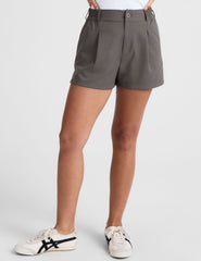 grey mid rise shorts with pockets and an elastic waistband with belt loops.
