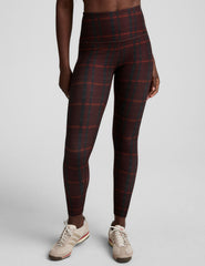 red plaid printed high-waisted midi length leggings.