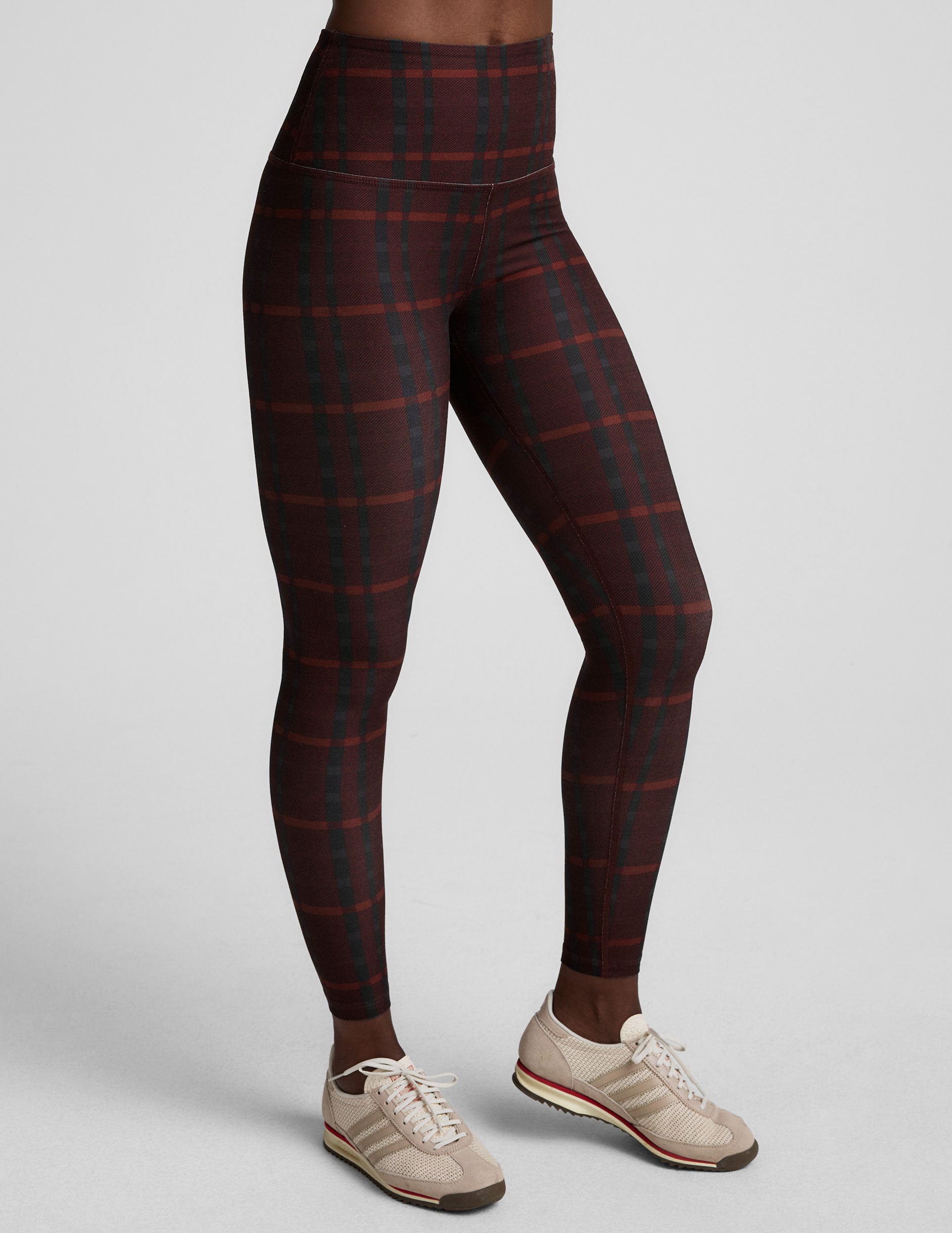 red plaid printed high-waisted midi length leggings.