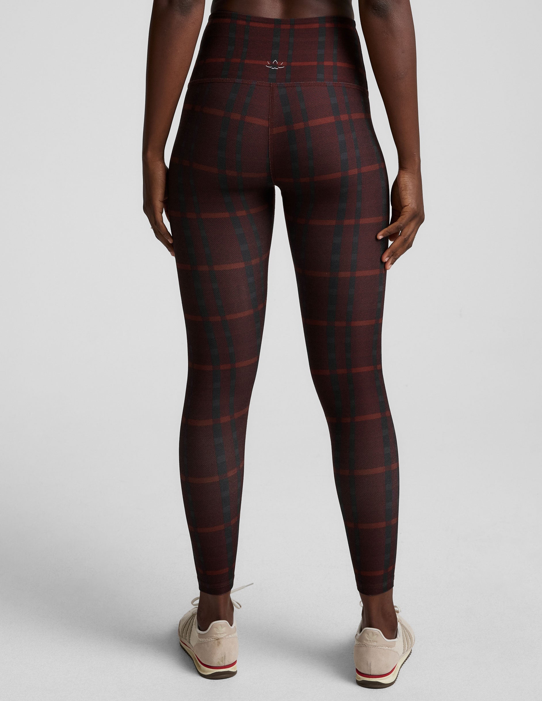 red plaid printed high-waisted midi length leggings.