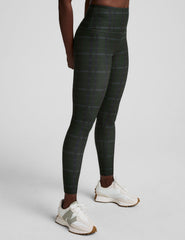 green plaid printed high-waisted midi length leggings.