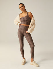 brown faux snakeskin printed high-waisted midi leggings.