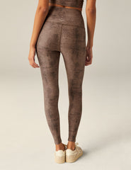 brown faux snakeskin printed high-waisted midi leggings.
