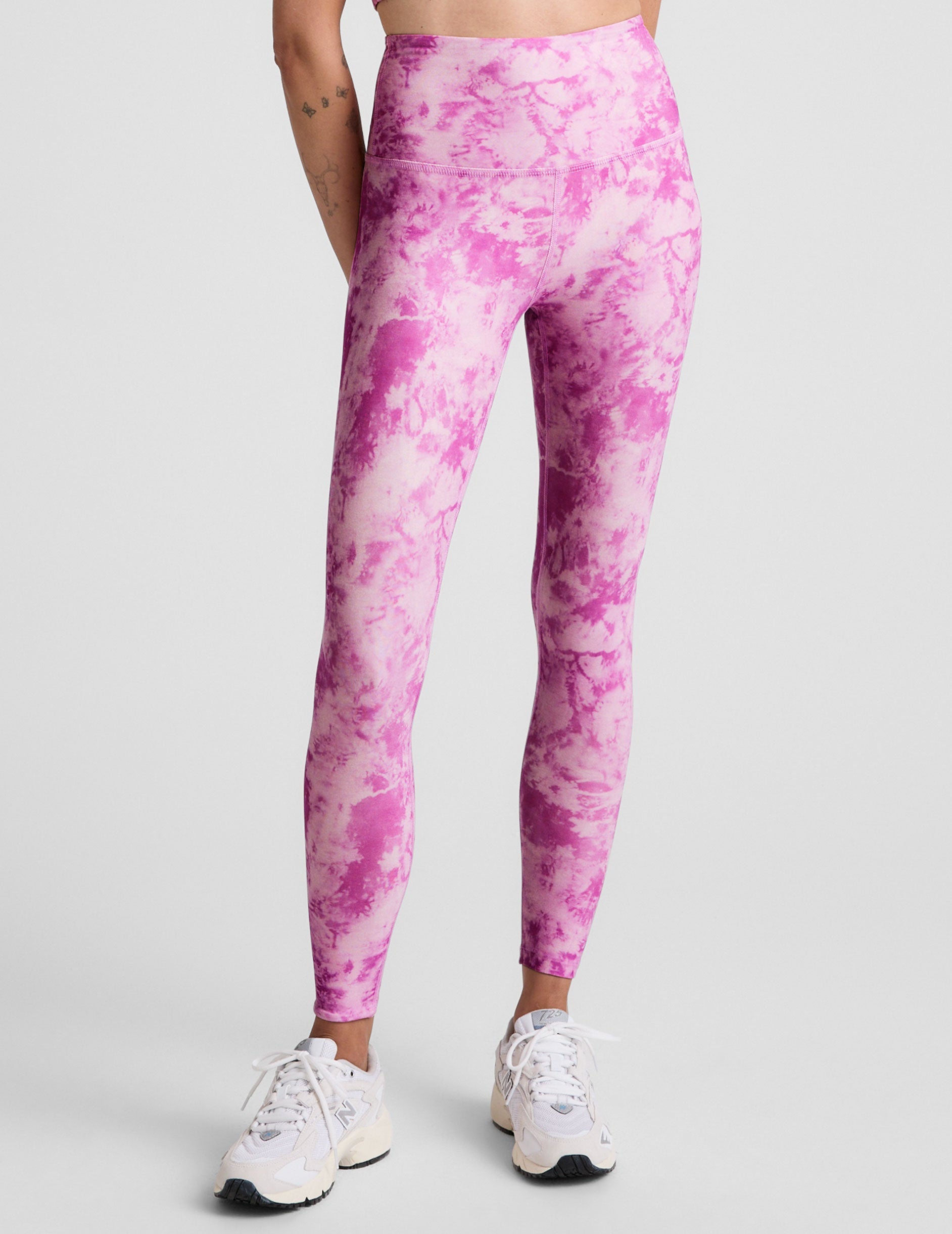 pink and white ice dye print high-waisted midi length leggings.