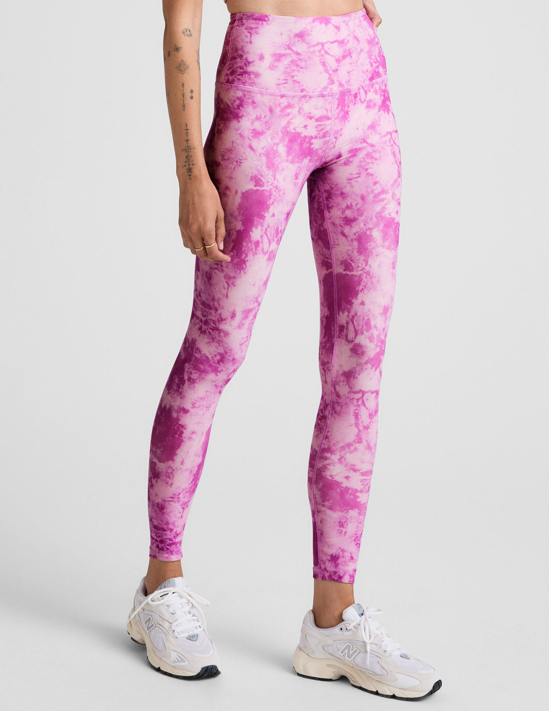 pink and white ice dye print high-waisted midi length leggings.