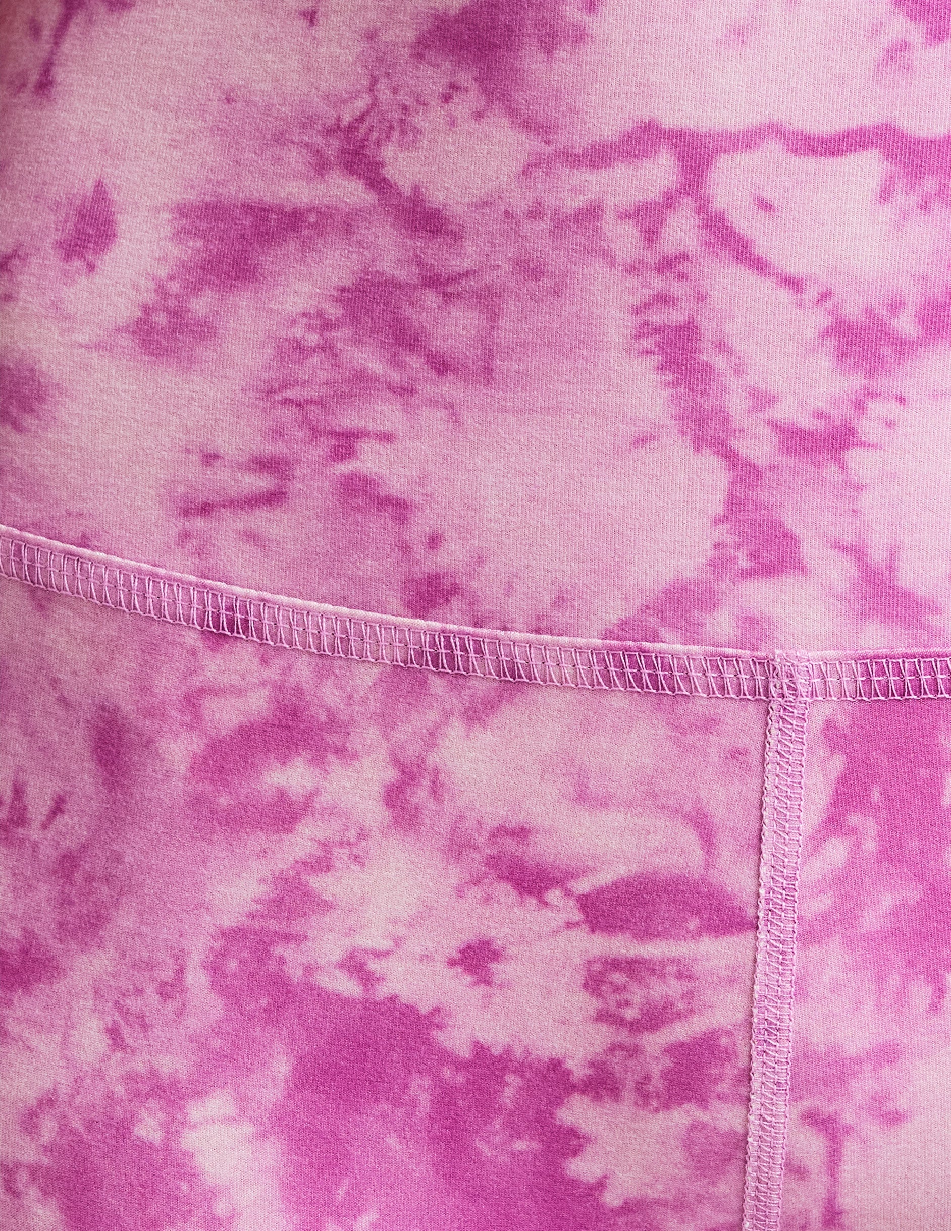 pink and white ice dye print high-waisted midi length leggings.
