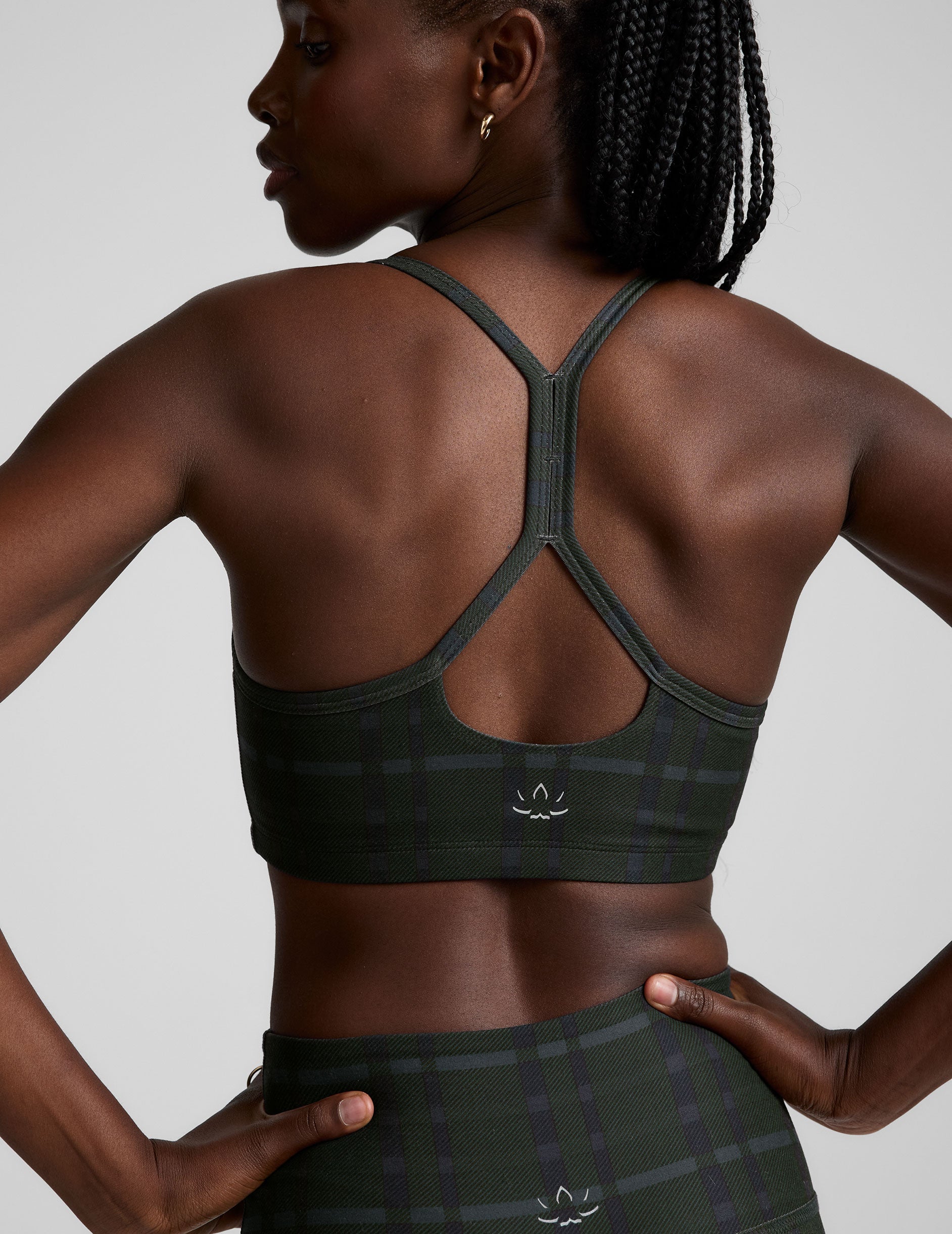 green plaid printed racerback style bra with thin straps.