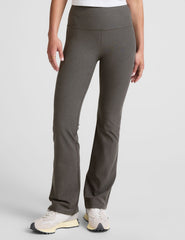 grey high-waisted bootcut pants.
