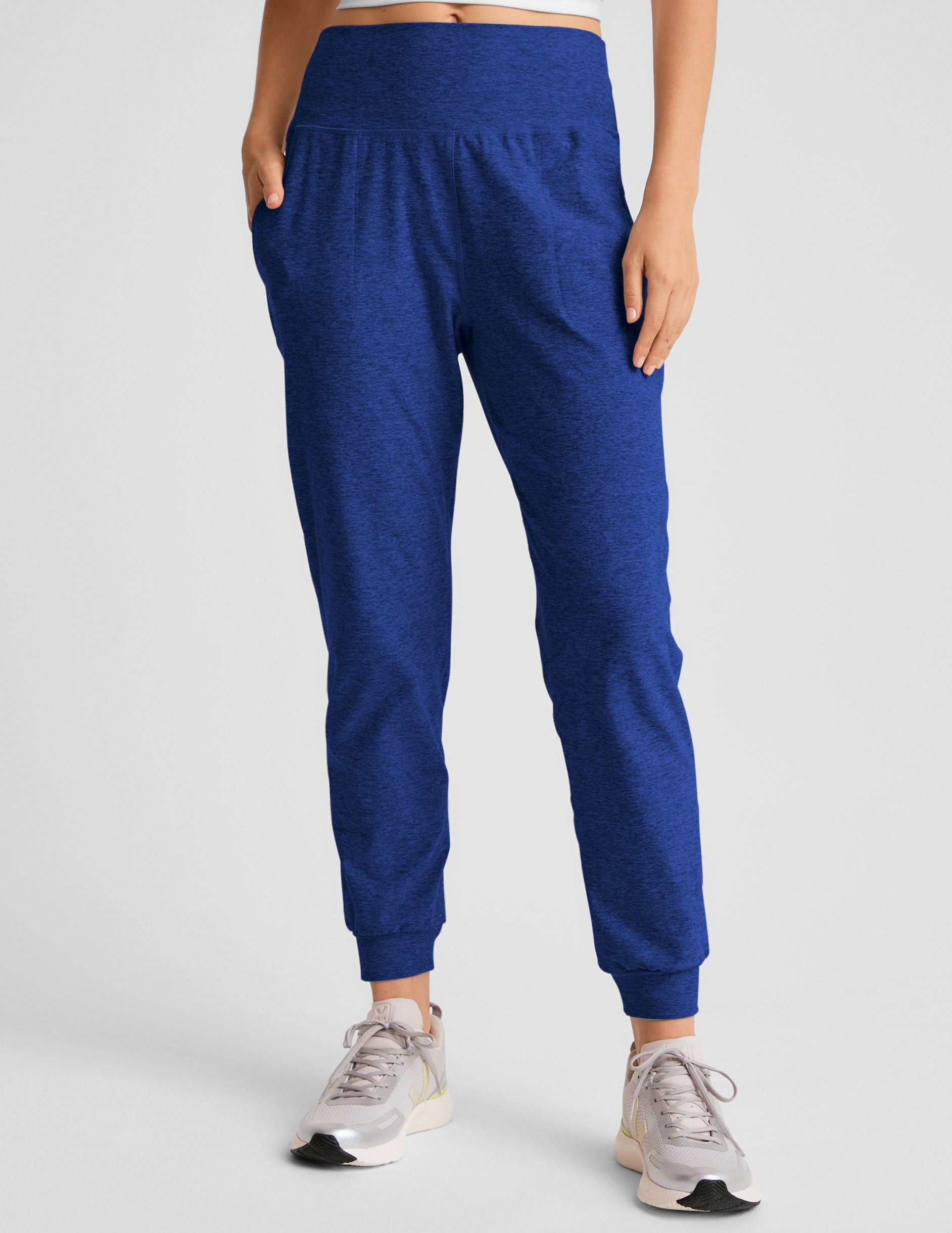 blue midi length joggers with side pockets.