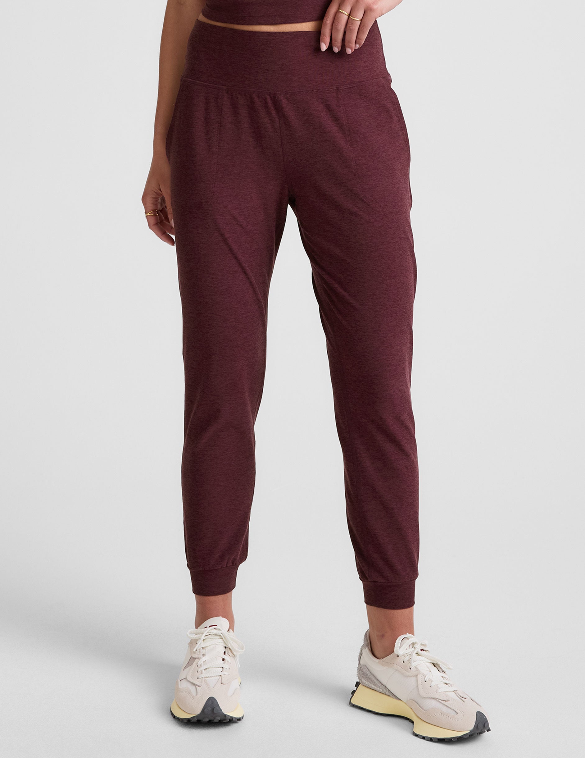 red midi length joggers with pockets.