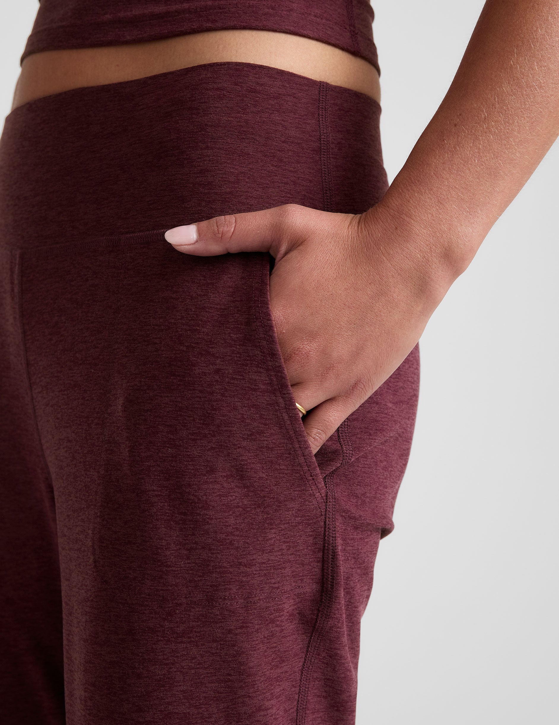 red midi length joggers with pockets.