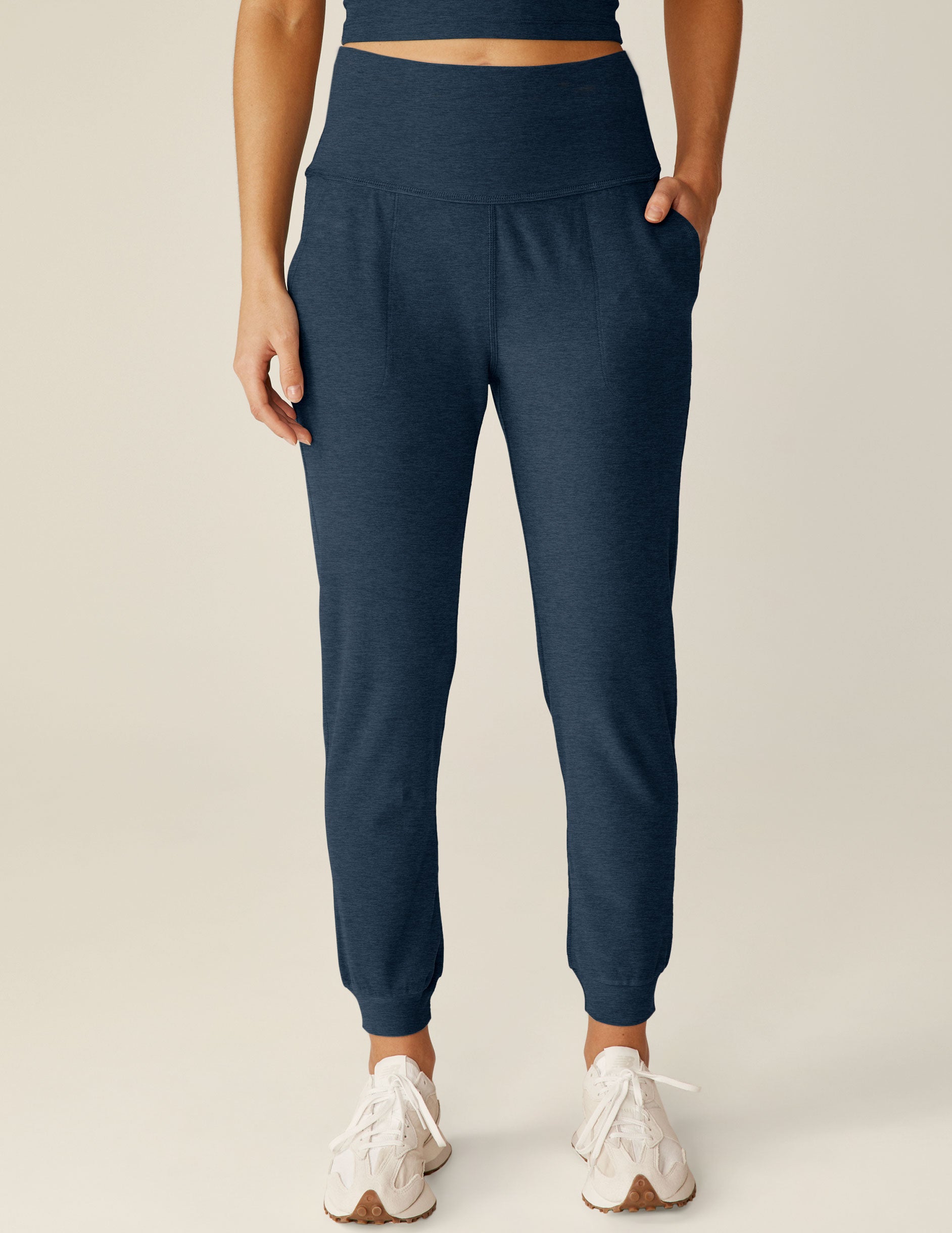 blue high-waisted jogger with pockets.