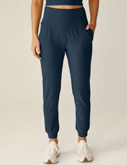 blue high-waisted jogger with pockets.
