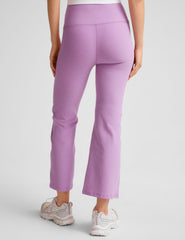 purple high-waisted flare cropped pants.