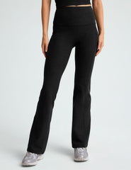 black high-waisted flare leggings with front side pockets.