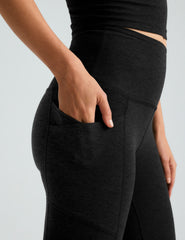 black high-waisted flare leggings with front side pockets.