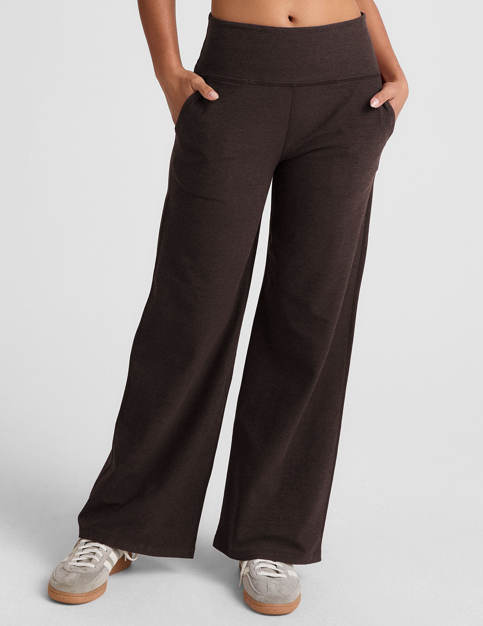 brown mid-rise wide leg pants with pockets.