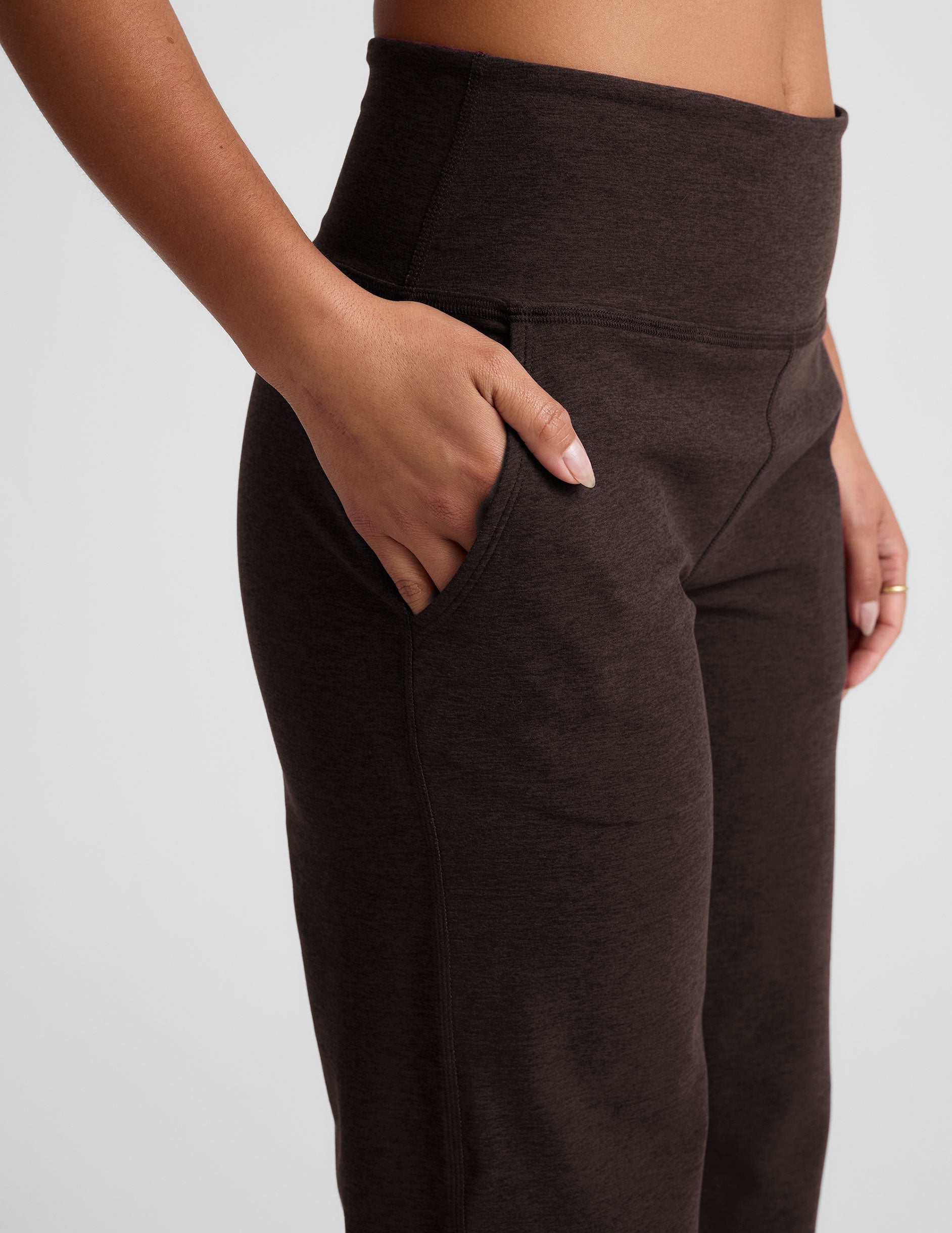 brown mid-rise wide leg pants with pockets.
