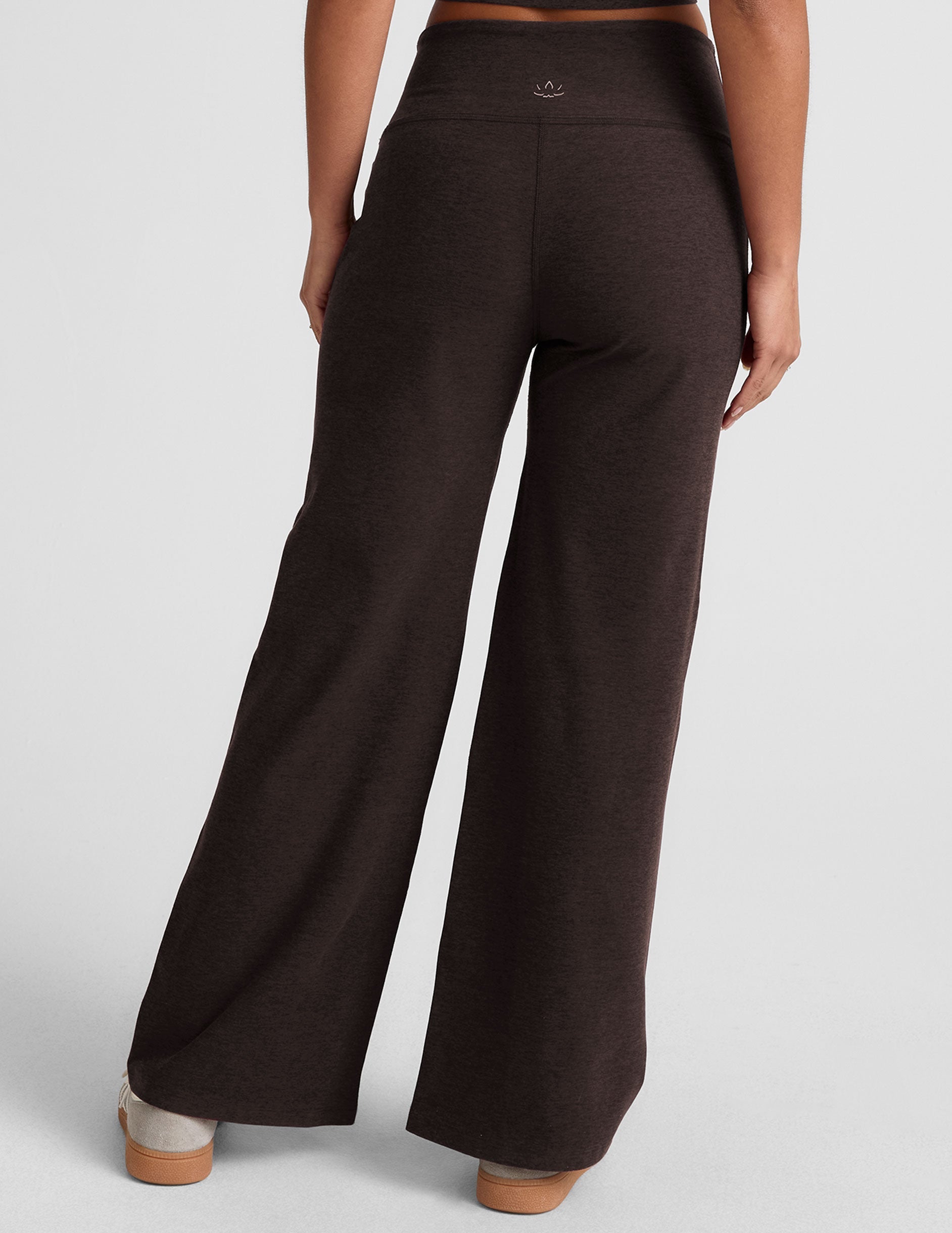 brown mid-rise wide leg pants with pockets.