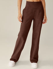 brown high-waisted wide leg pants with pockets.
