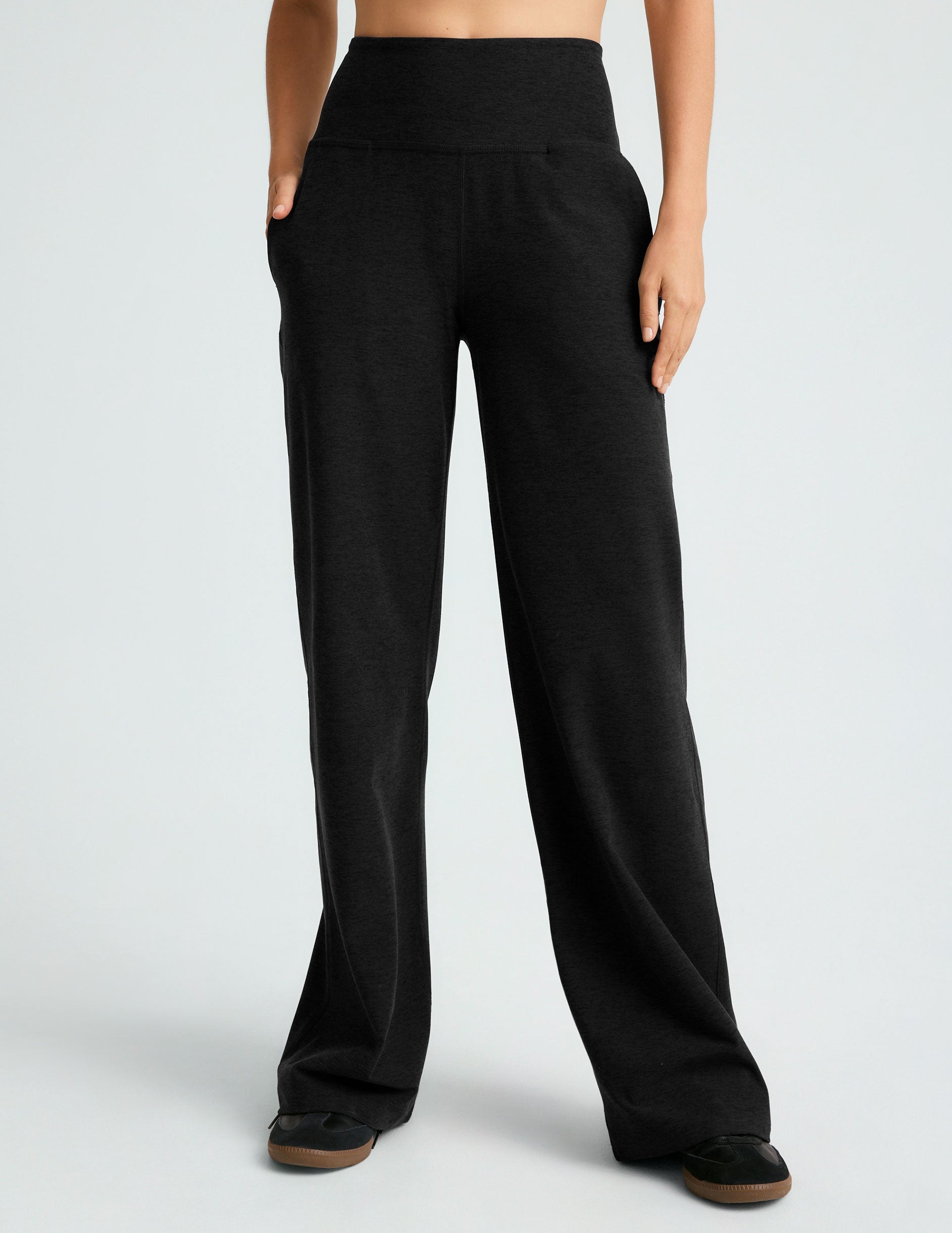black high-waisted 29" inseam pants with pockets. 