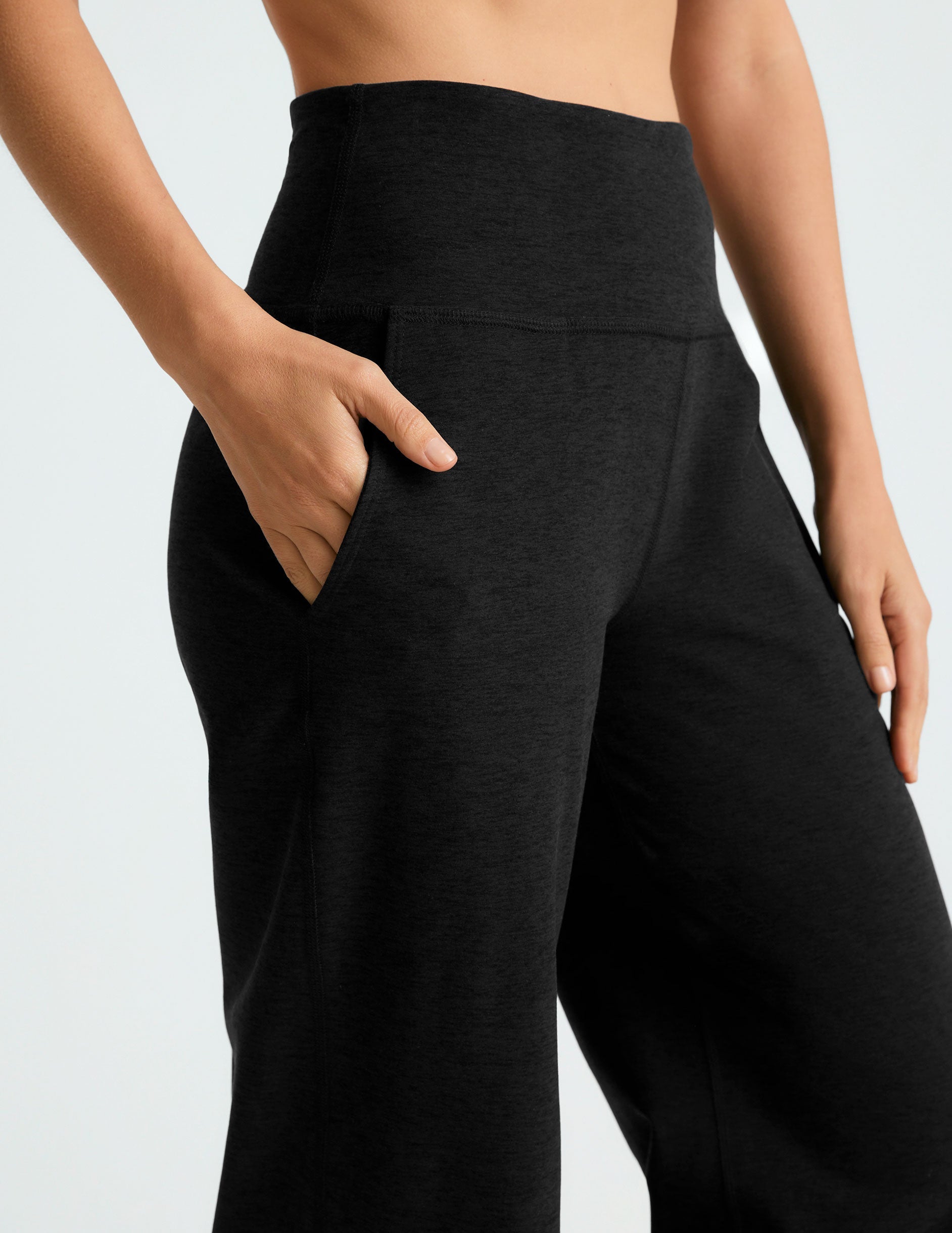 black high-waisted 29" inseam pants with pockets. 