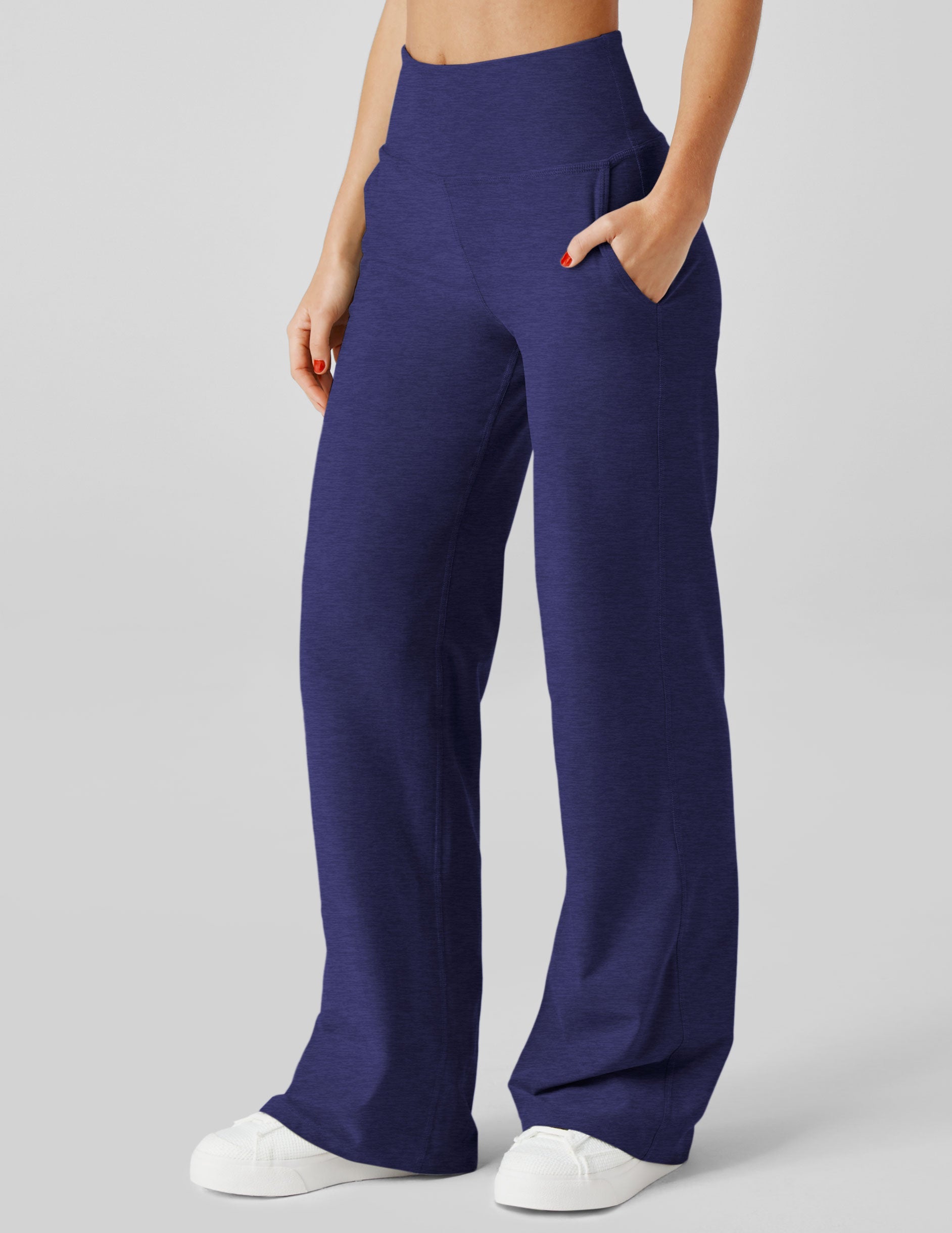 blue high-waisted pants with pockets.