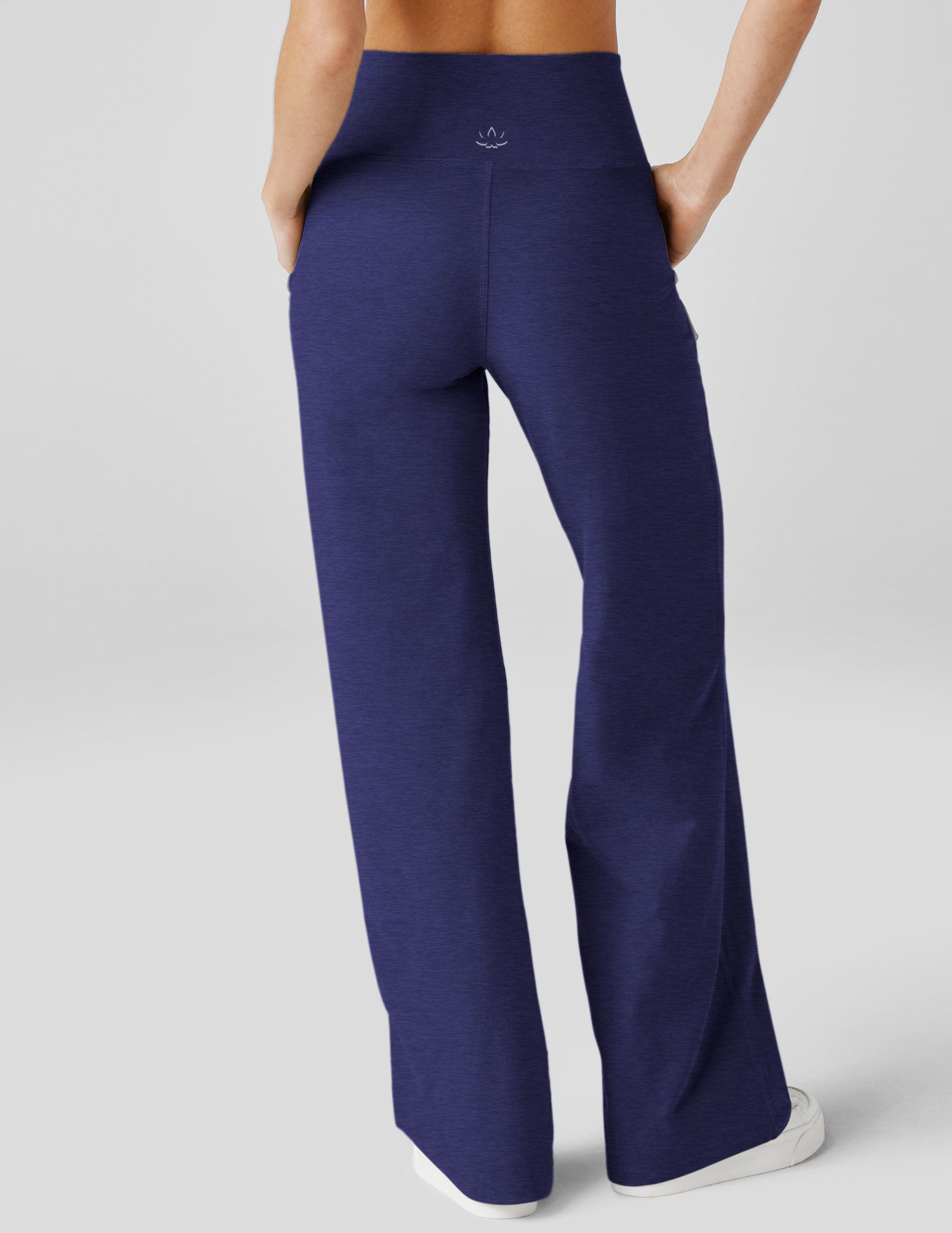 blue high-waisted pants with pockets.