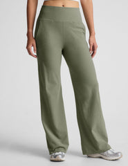 green high-waisted wide leg pants with pockets.