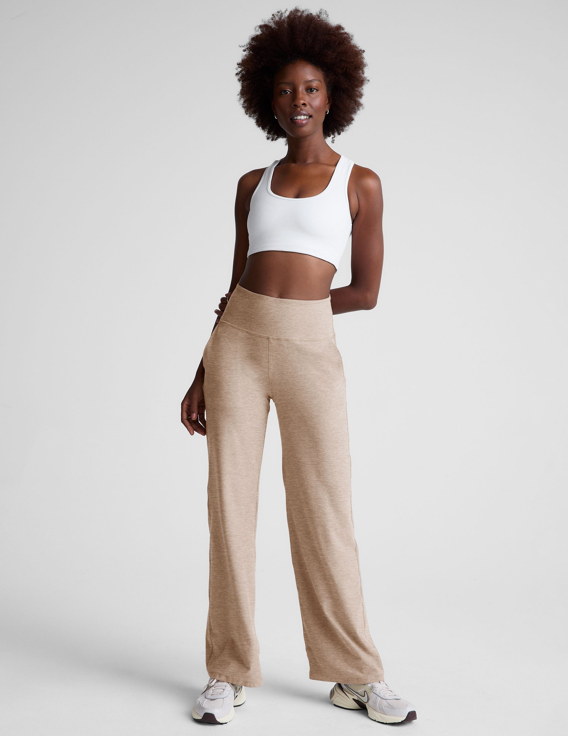 brown high-waisted pants with pockets.