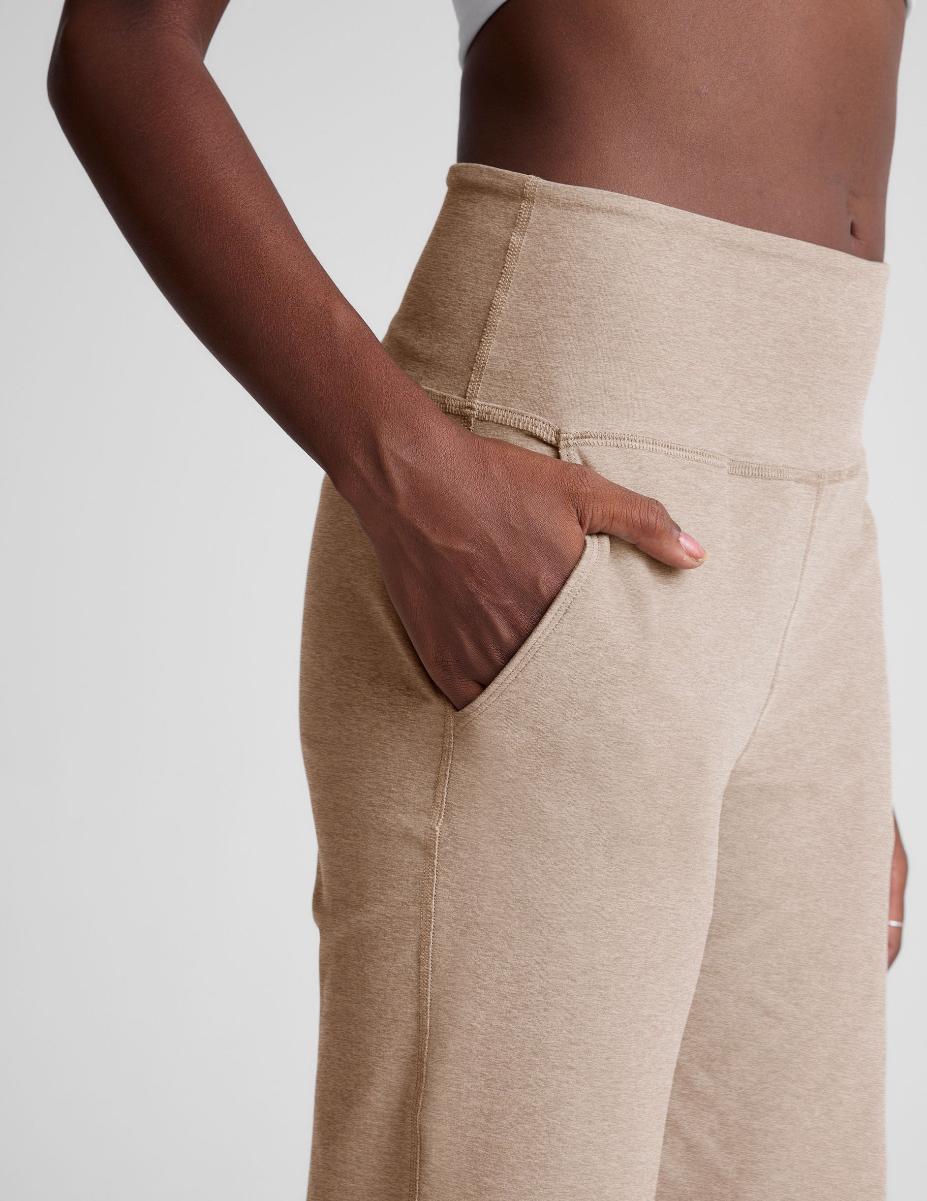 brown high-waisted pants with pockets.