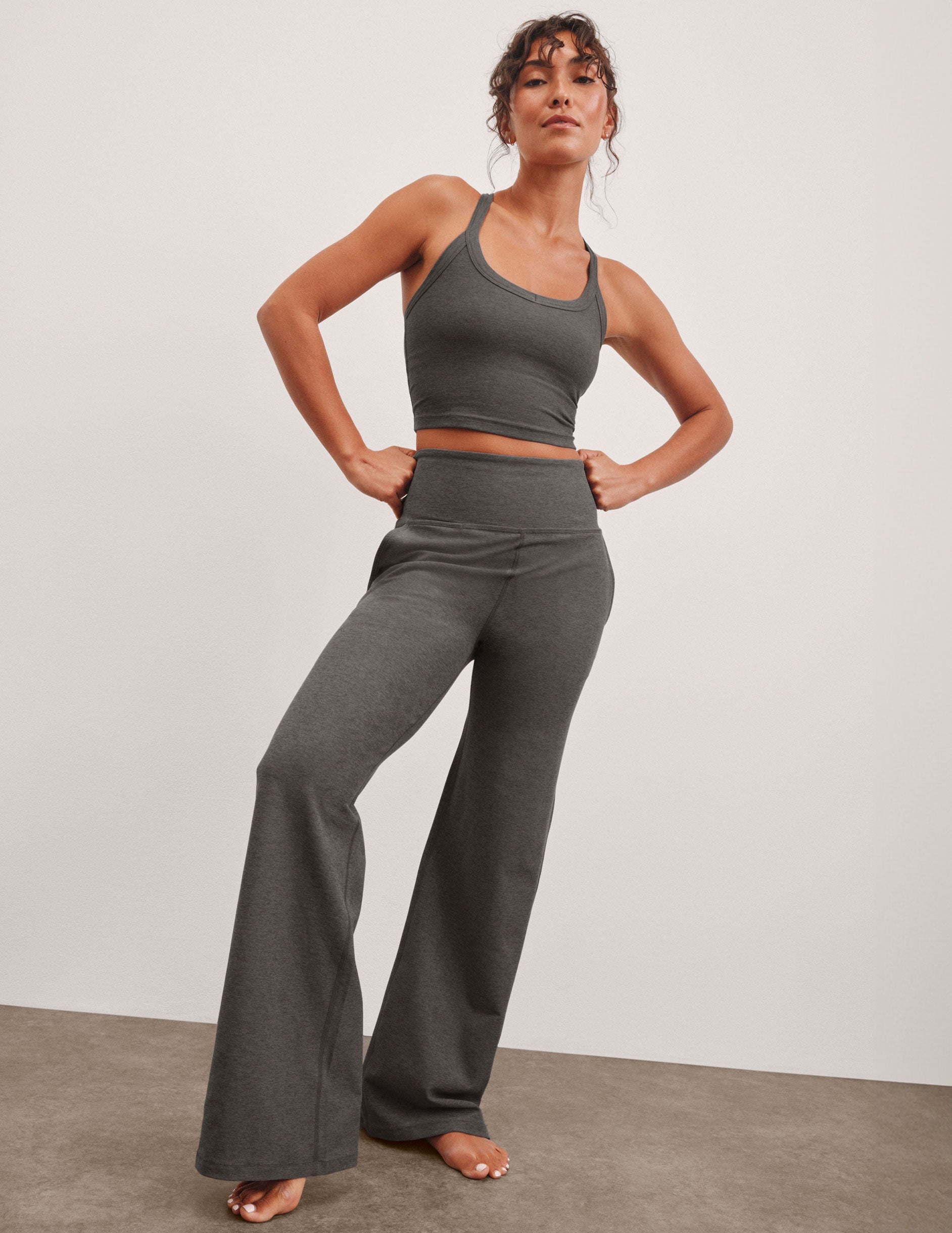 grey high-waisted wide leg pants with pockets.