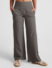 grey high-waisted wide leg pants with pockets.