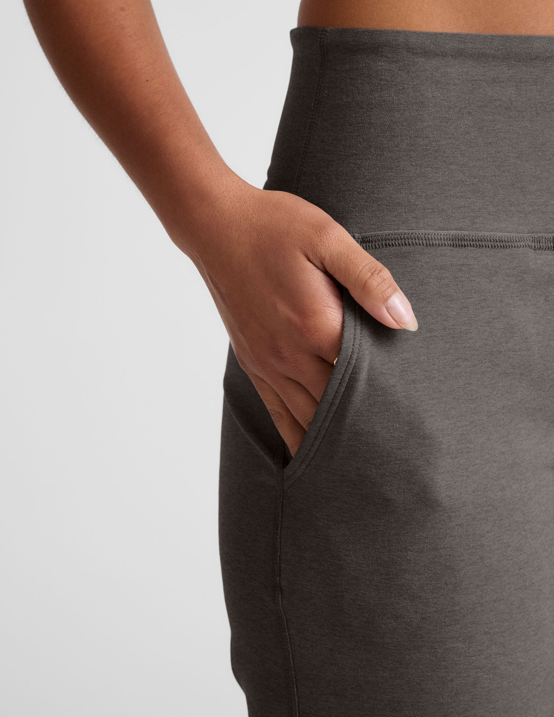 grey high-waisted wide leg pants with pockets.