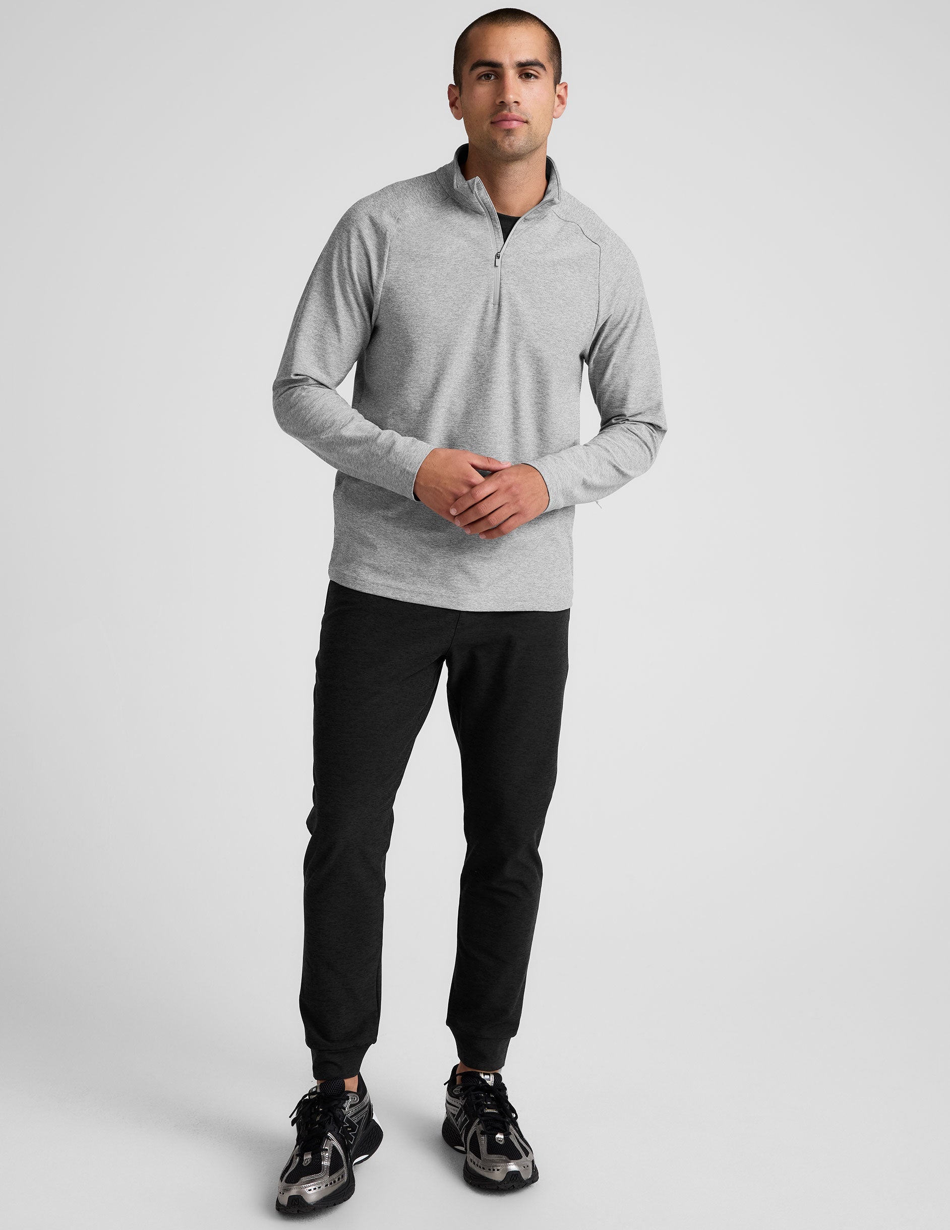 black men's joggers with side zippered hand pockets.