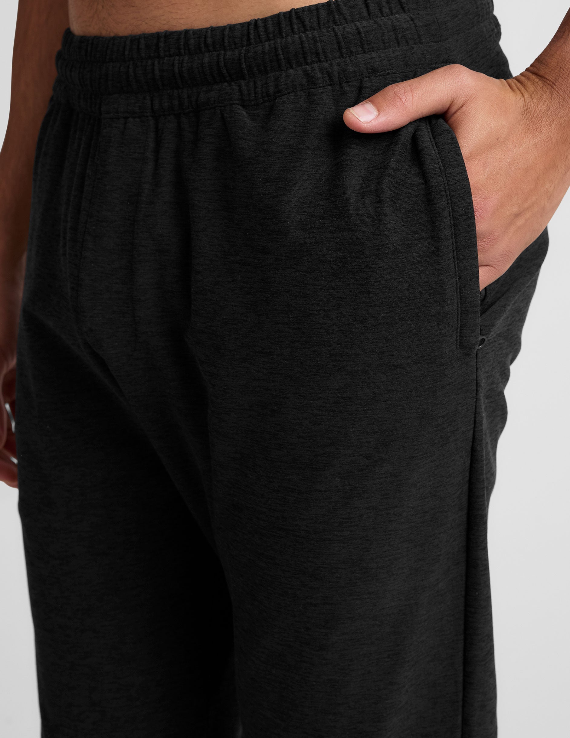 black men's joggers with side zippered hand pockets.