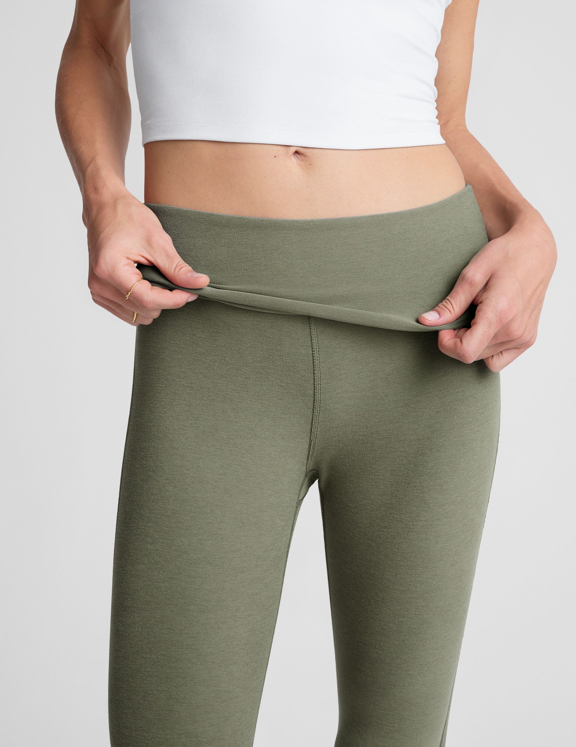 green bootcut pants with a foldover waistband.