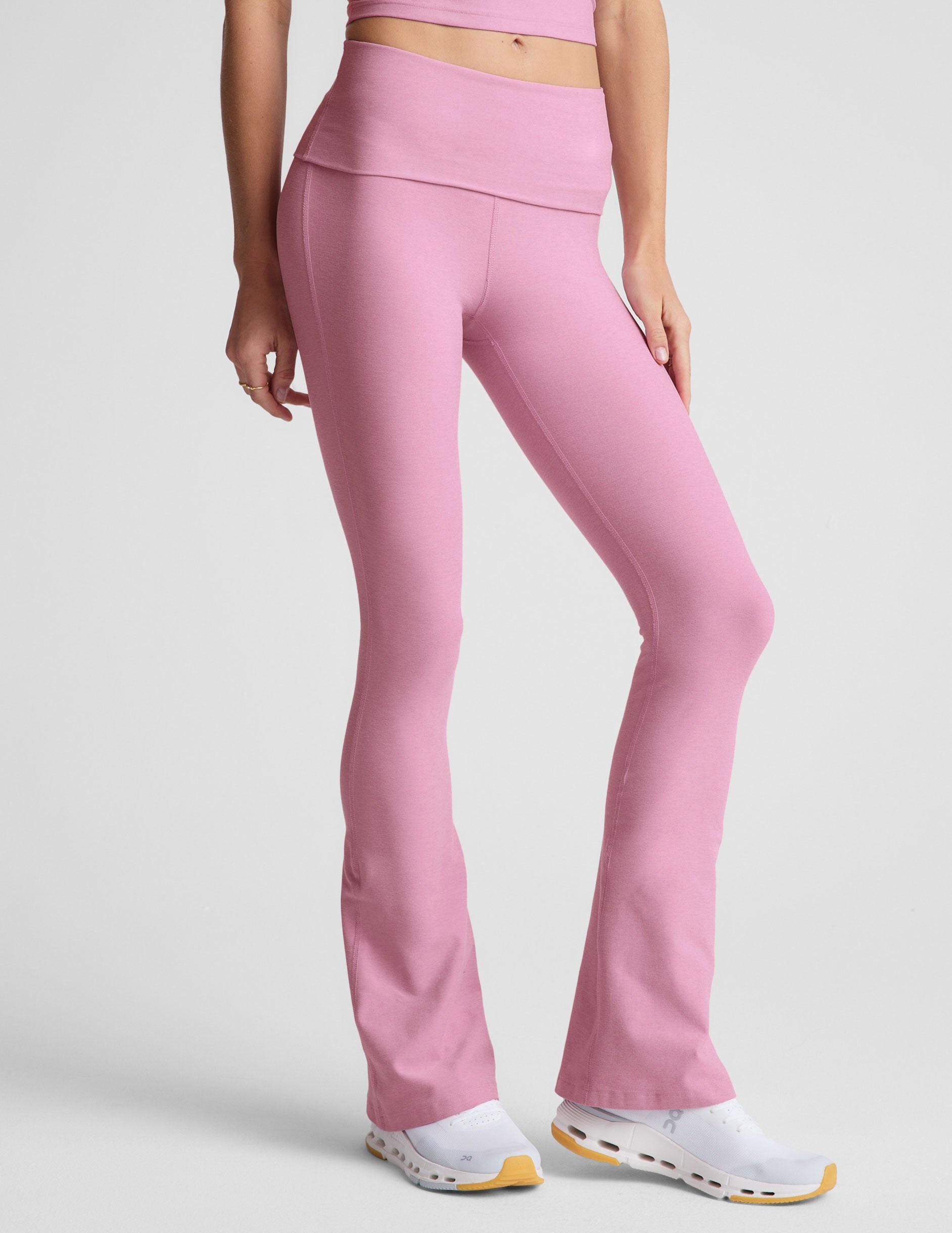 pink bootcut pants with a foldover waistband.